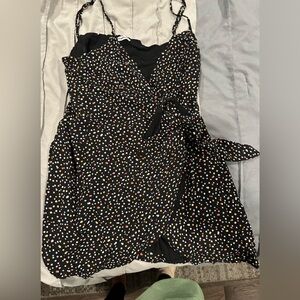 REFORMATION Confetti Sleeveless Wrap Top. Adjustable straps. Wraps around.